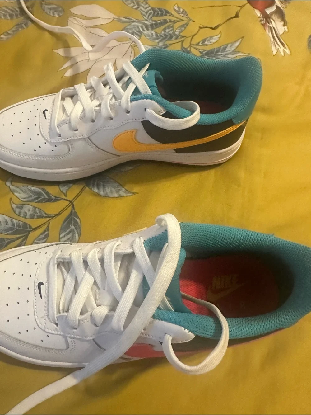 Nike Kids White Low-Top Sneakers with Teal and Pink Accents
